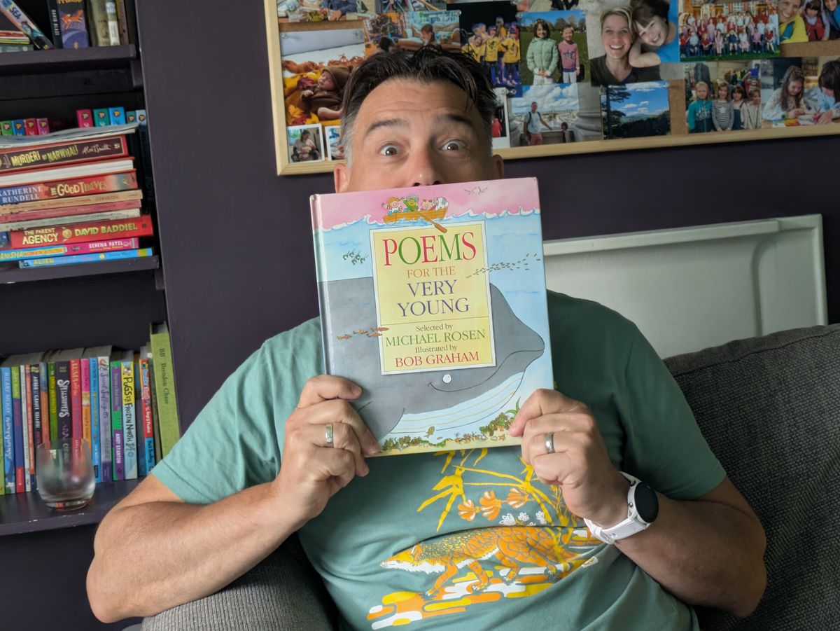 Grandpa holding Poems for the
Very Young